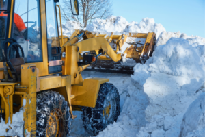 Trucks Plowing Snow