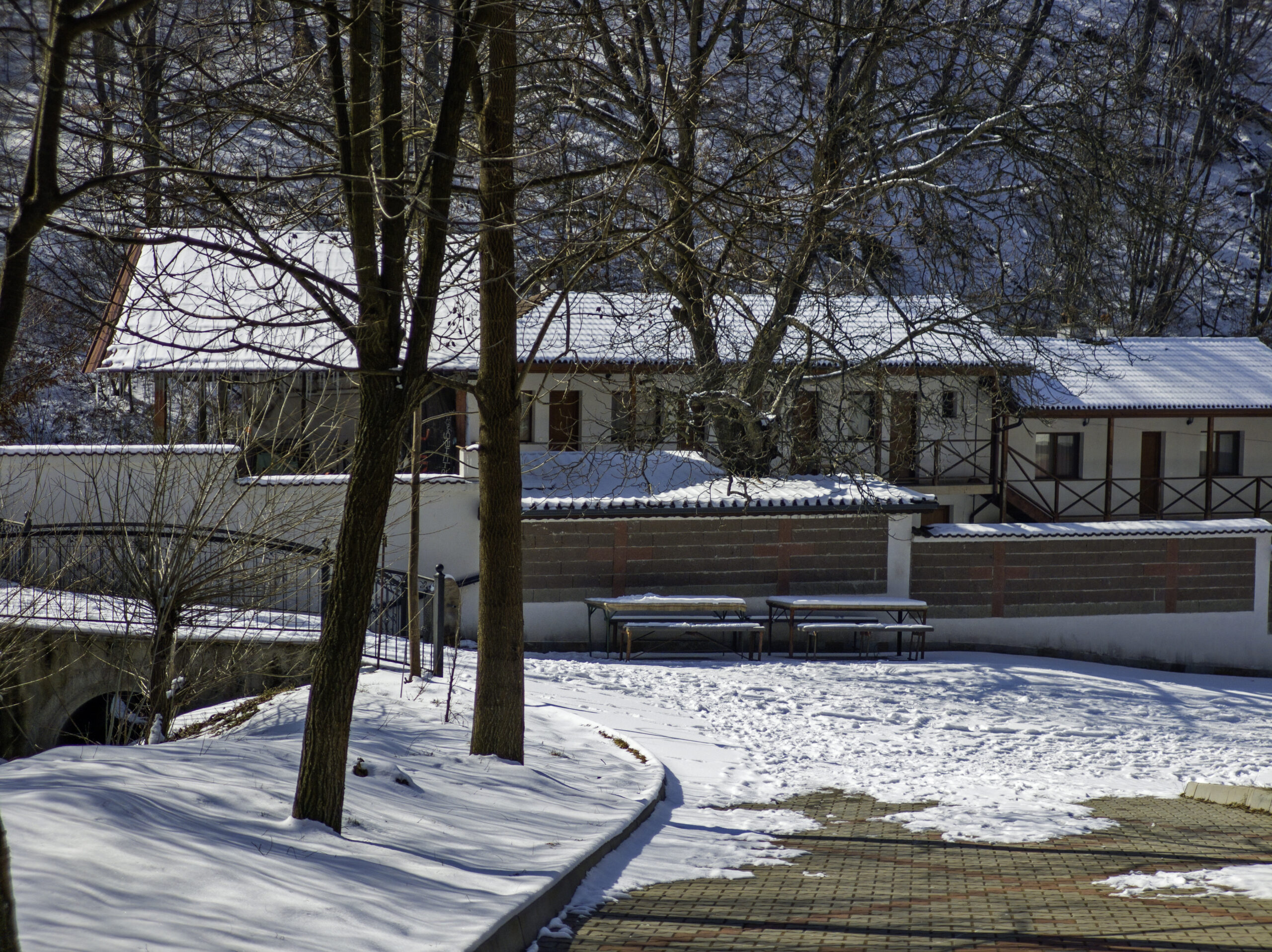 Dark rust stains and water spots on outdoor concrete surface